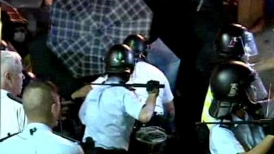 Police use batons in underpass