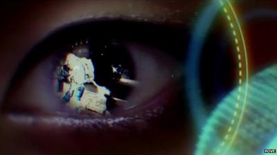 Still from Fove demo video, showing reflection of an astronaut in a human eye
