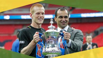 Wigan Athletic's Ben Watson and Roberto Martinez lift the 2013 FA Cup