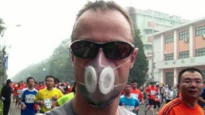 Running marathon in a smog mask