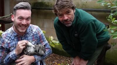 Martin meeting Nimbus the leopard cub and her keeper Jamie