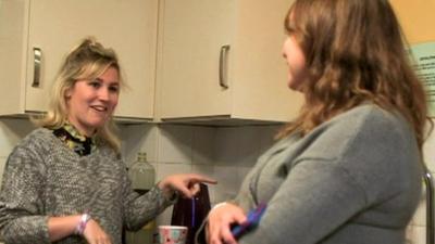 Molly in her university kitchen