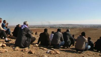 Kurds watch fighting in Kobane