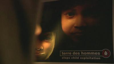 close up of images of fake teen 'Sweetie' with 'terre des hommes' logo