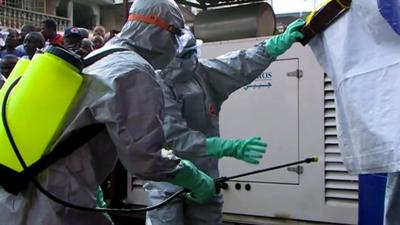 Training on carrying out a safe Ebola burial in Sierra Leone