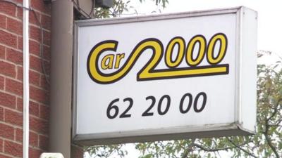 Car 2000 sign