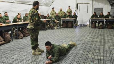 Picture showing Afghan military trainers