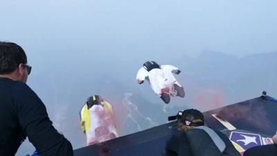 Wingsuit base jumpers taking part in World Wingsuit League competition in China
