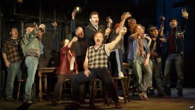 Jimmy Nail (standing, centre) plays shipyard foreman Jackie White in the Broadway musical