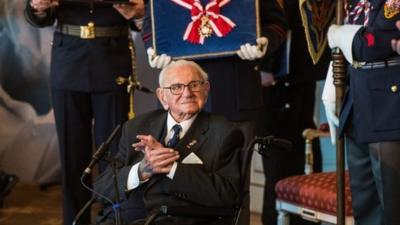 British Sir Nicholas Winton (C) receives the Order of the White Lion from Czech President Milos Zeman at Prague Castle in Prague