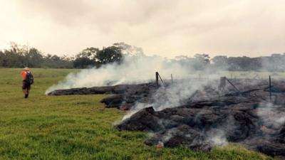 Lava flow in anopen field below Apa'a Street and Cemetery Road on 26 October in Pahoa, Hawaii