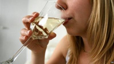 Woman drinking wine