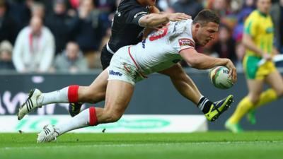 Sam Burgess of England scores his sides third try during the Rugby League World Cup Semi Final against New Zealand