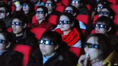Chinese movie-goers watch a 3D film