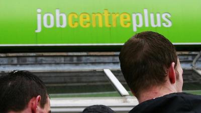 People standing outside a Job Centre in the United Kingdom