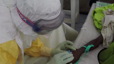 Aid worker treating Ebola patient