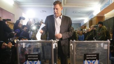 Alexander Zakharchenko, separatist leader of the self-proclaimed Donetsk People's Republic, casts a ballot during its leadership and local parliamentary elections at a polling station in Donetsk November 2, 2014