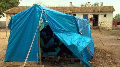 tent in schoolyard