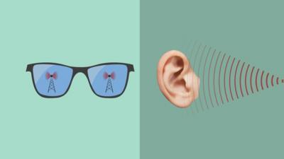 Illustration of glasses and ear receiving radio waves