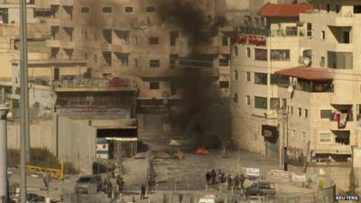 Black smoke from burning dumpster in Jerusalem