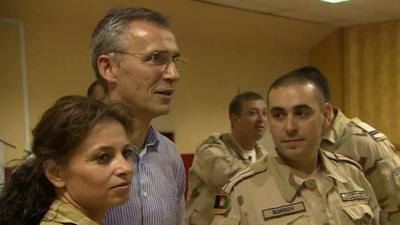 Jens Stoltenberg and troops