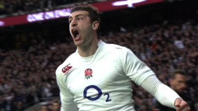 England's Jonny May celebrates after scoring his first international try