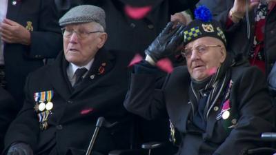 Close up of two veterans at the ceremony in Ypres