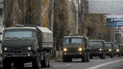 A convoy of unmarked military vehicles IN Donetsk