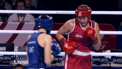 Should women boxers remove headguards?