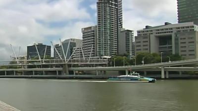 Shot of a Brisbane skyscraper on the river