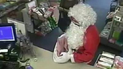 CCTV footage of robber dressed as Santa