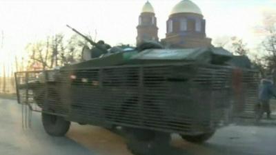 An armoured car on the street