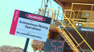 Warning sign about autonomous mining operations