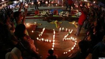 Candles arranged in honour of the 43 missing students