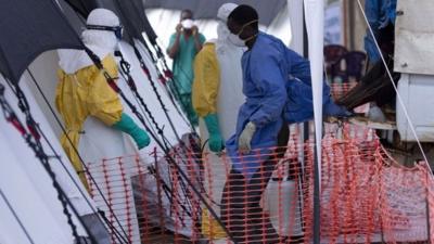 Health workers wearing personal protective equipment