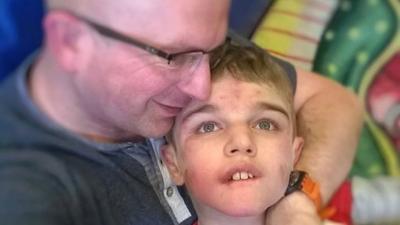 Phill Wills with son Josh