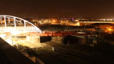 The bridge being inched into place