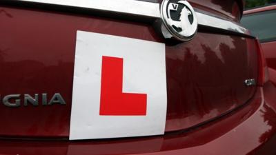 An L Plate on a car