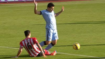 Jose Fonte tackles Sergio Aguero