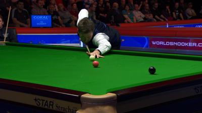 Ricky Walden lines up at pot on the pink at the UK Snooker Championship in York