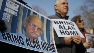 Protesters call for the return of Alan Gross