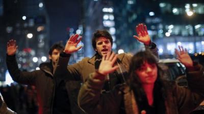 People take part during a protest in support of Eric Garner at the 6th Avenue on December 3, 2014 in New York City.