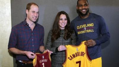 Prince William, Duke of Cambridge (L) and Catherine, Duchess of Cambridge pose with LeBron James