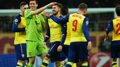 Aaron Ramsey of Arsenal (C) celebrates with team mates as he scores their third goal during the UEFA Champions League Group D match at Galatasaray.