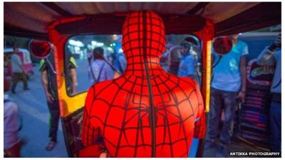 Spiderman driving a toktok in Egypt