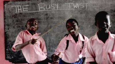 Schoolchildren dancing in Ghana