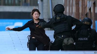 Woman runs from siege