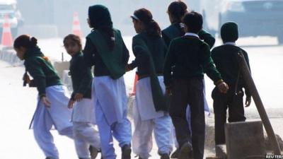 Children fleeing the school