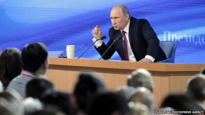 Russian President Vladimir Putin speaks during his annual news conference