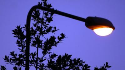 Close up of street light at dusk